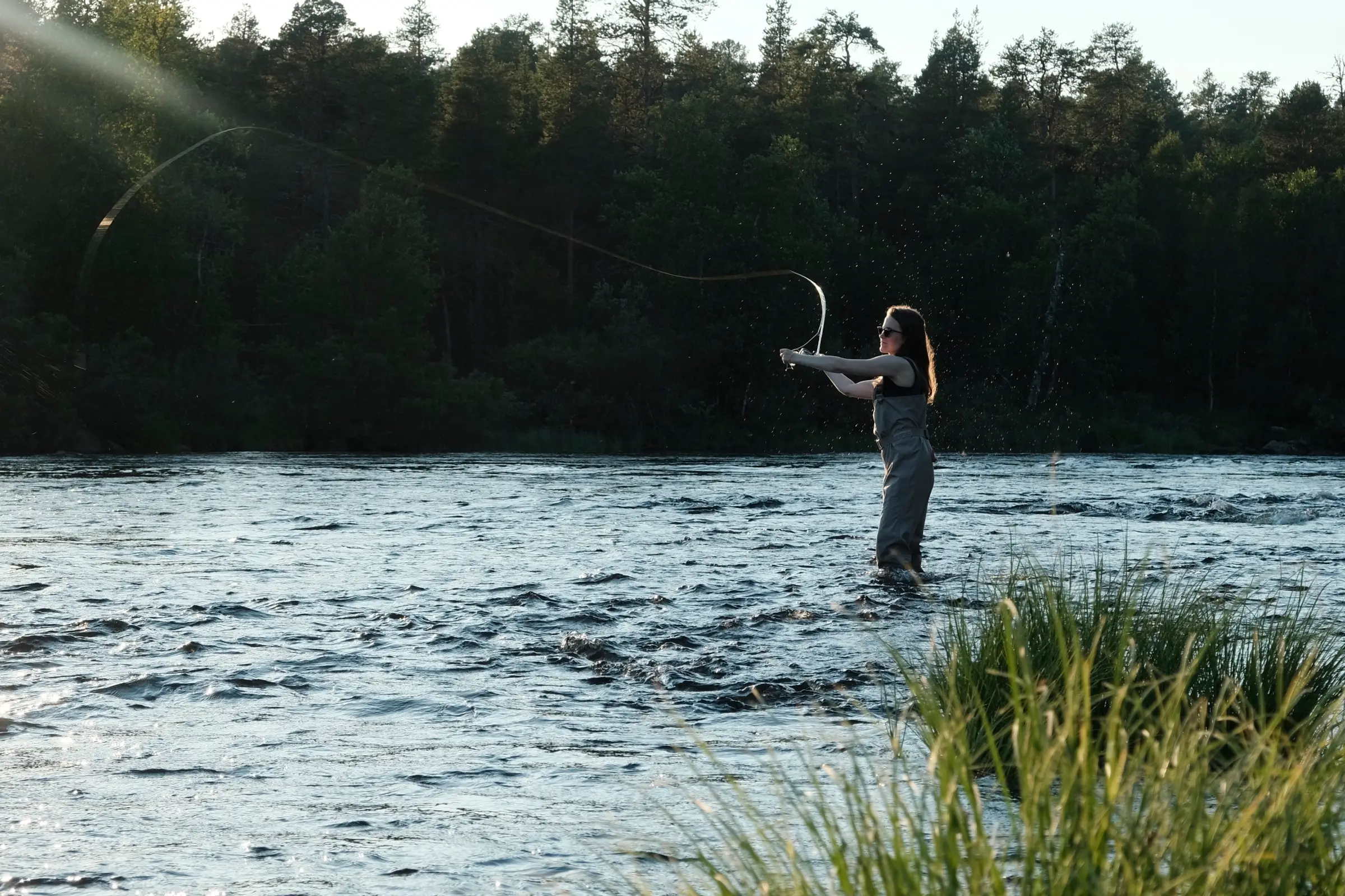 Casting in golden evening light